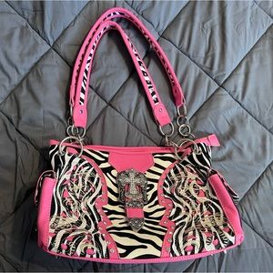 Hot pink with zebra print and a gem cross